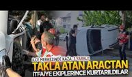 Takla atan araçtan itfaiye ekiplerince çıkarıldılar