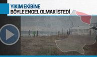 İşyeri sahibi, yıkım ekibine böyle engel olmak istedi