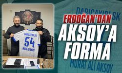 Erdoğan’dan Aksoy’a forma