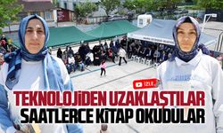 Teknolojiden uzaklaştılar, okul bahçesinde toplanarak kitap okudular