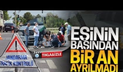 Yaralı eşinin başından bir an ayrılmadı