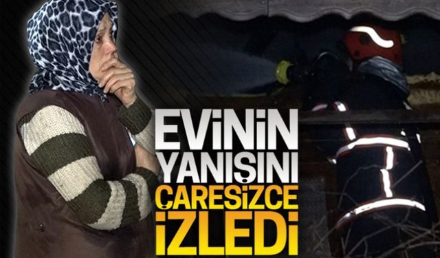 Evinin yanışını çaresizce izledi