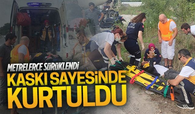 Metrelerce sürüklendi, kaskı sayesinde kurtuldu