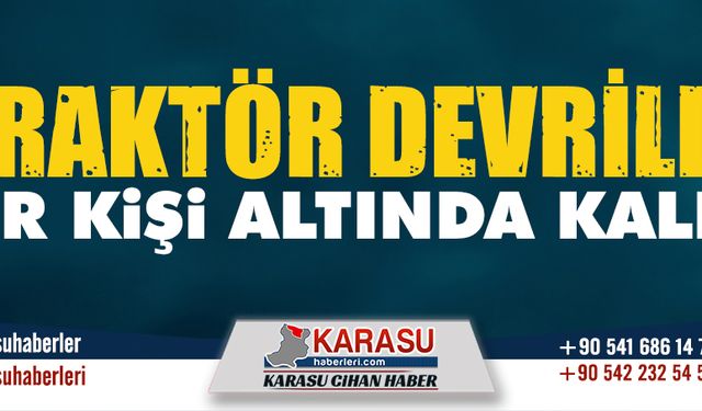 Devrilen traktörün altında kaldı