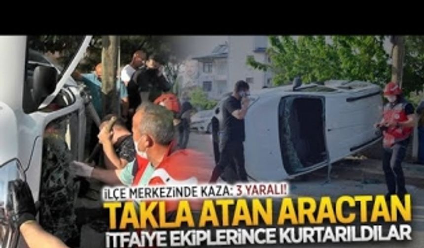 Takla atan araçtan itfaiye ekiplerince çıkarıldılar