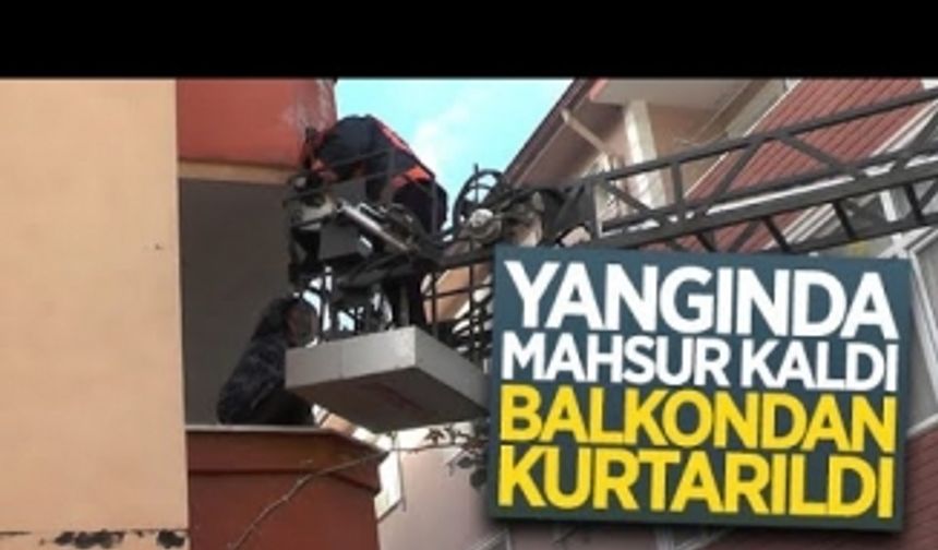 Yangında mahsur kaldı, balkondan kurtarıldı