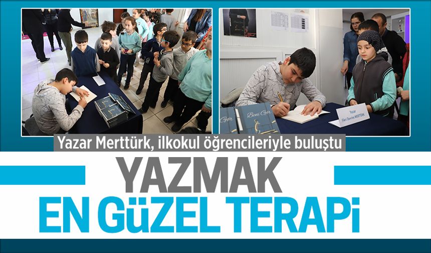 Merttürk, Fatih Sultan Mehmet İlkokulu öğrencileri için kitabını imzaladı